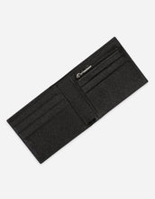 Load image into Gallery viewer, Dauphine calfskin bifold wallet with leopard print against a green background