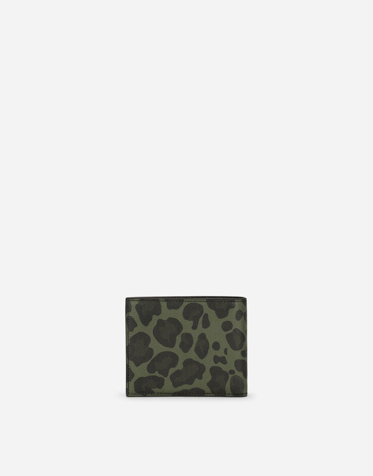 Dauphine calfskin bifold wallet with leopard print against a green background
